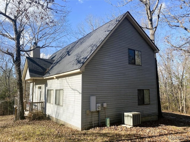 view of property exterior featuring central AC