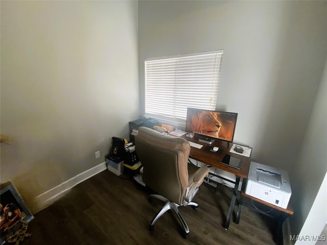 home office with dark wood-type flooring