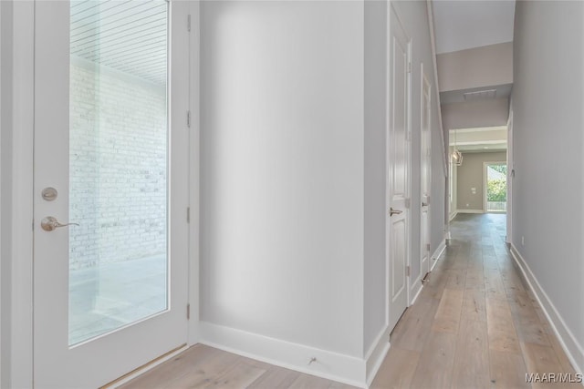 hall featuring light hardwood / wood-style flooring