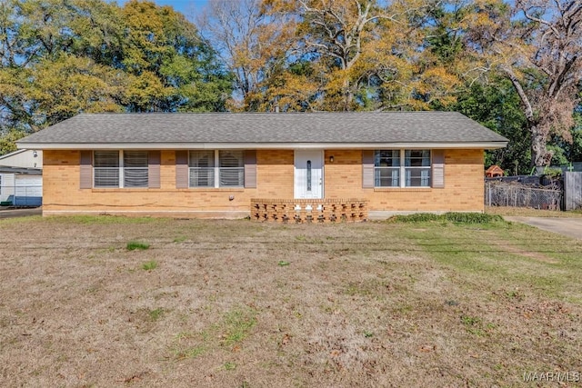 single story home with a front yard