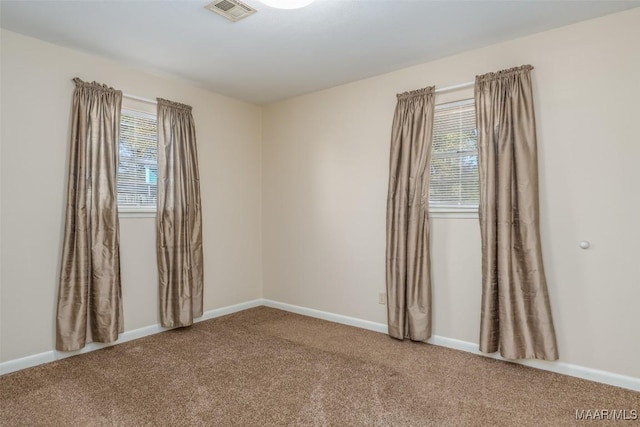 view of carpeted spare room