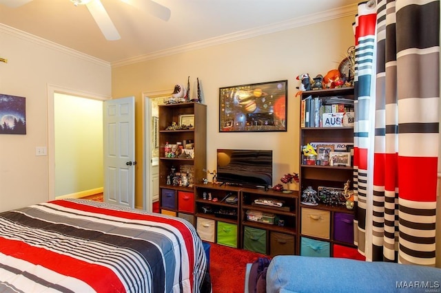 bedroom featuring ceiling fan and ornamental molding