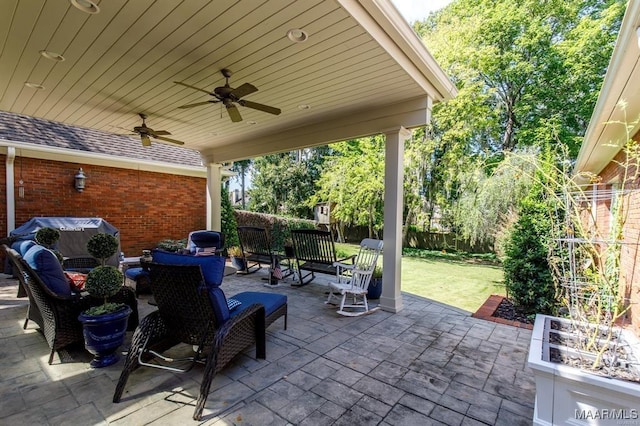 view of patio with ceiling fan and an outdoor hangout area