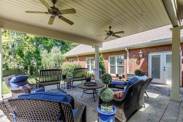 view of patio with outdoor lounge area, ceiling fan, and french doors