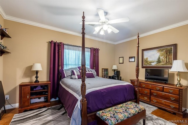 bedroom featuring wood-type flooring, ceiling fan, and ornamental molding