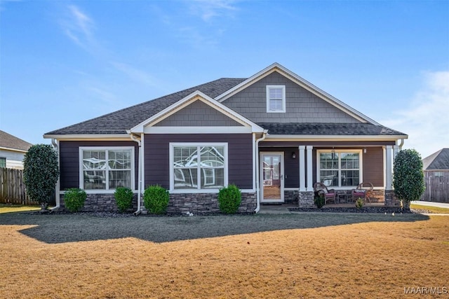 craftsman inspired home featuring covered porch