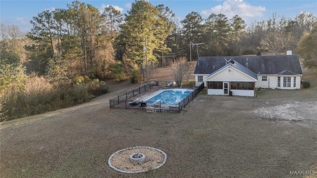 view of pool with a sunroom