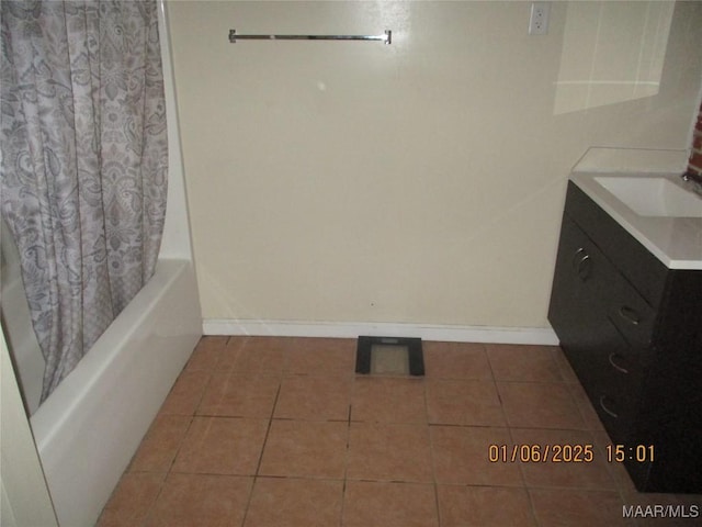 bathroom featuring shower / bath combo, vanity, and tile patterned floors