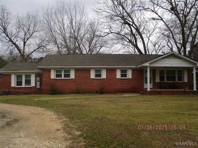 ranch-style house with a front lawn