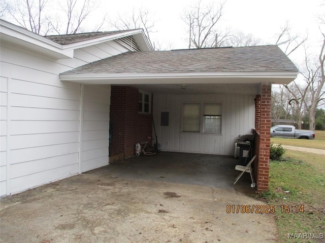 view of property exterior featuring a carport