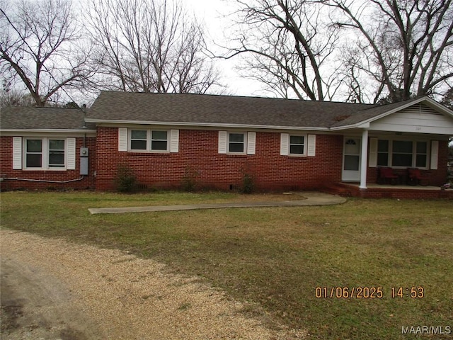 ranch-style home with a front yard