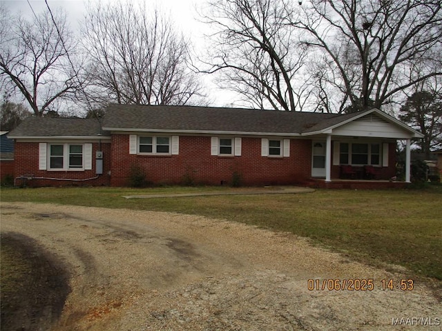 ranch-style house with a front lawn