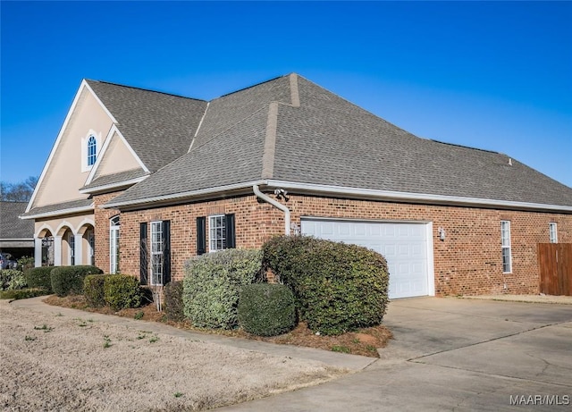 view of property exterior with a garage