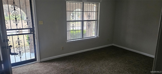 foyer featuring carpet