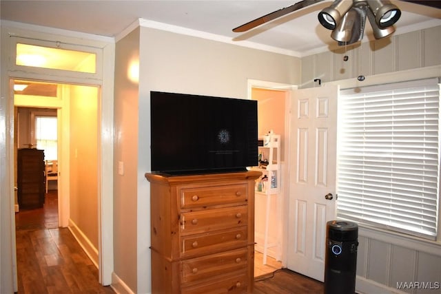 bedroom featuring dark hardwood / wood-style flooring and ornamental molding