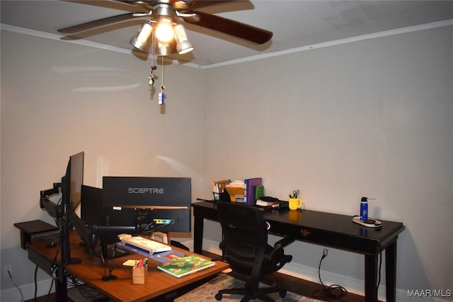 office area featuring ceiling fan and ornamental molding