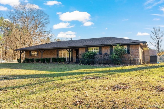 ranch-style home with a front yard