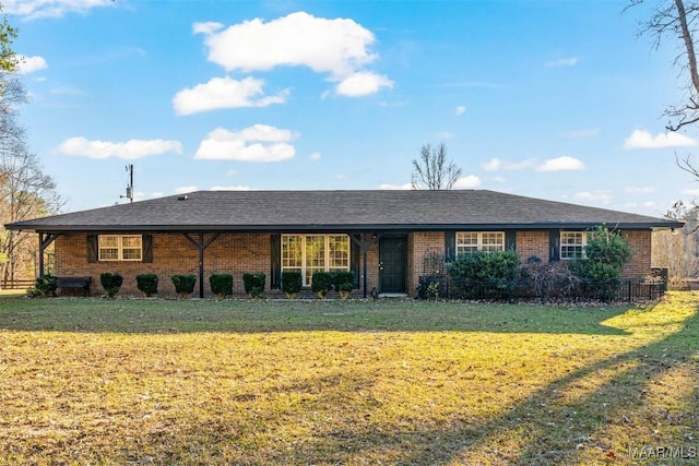 view of front of home with a front lawn