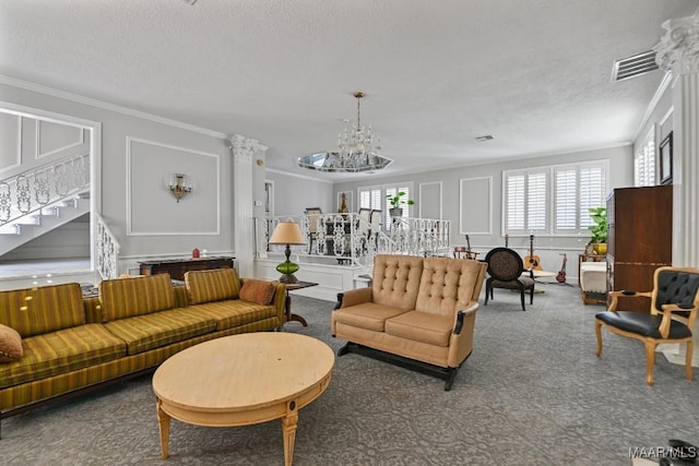 living room with crown molding, a textured ceiling, and a notable chandelier