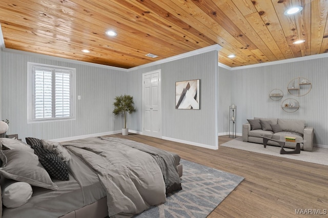 bedroom featuring wooden ceiling, wood-type flooring, and ornamental molding