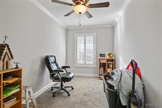 carpeted office featuring a textured ceiling, ceiling fan, and crown molding