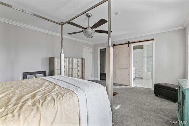 carpeted bedroom featuring a textured ceiling, ceiling fan, crown molding, a barn door, and connected bathroom