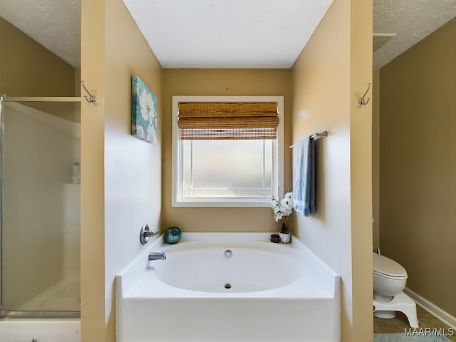 bathroom featuring tile patterned floors, independent shower and bath, a textured ceiling, and toilet