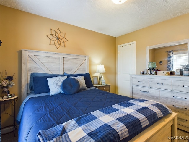 bedroom with a textured ceiling