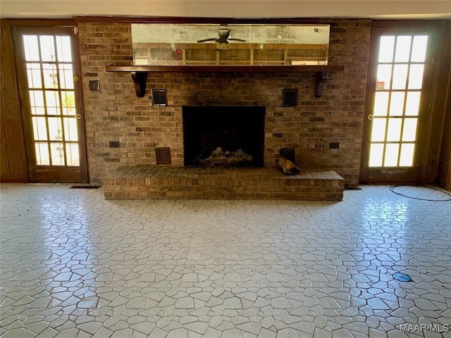 unfurnished living room featuring a fireplace