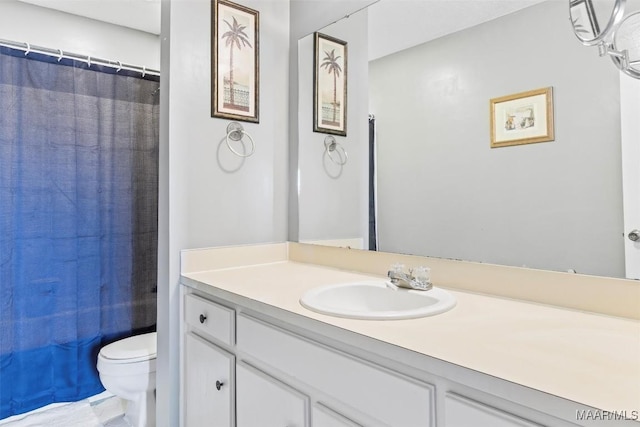 full bathroom featuring vanity, shower / bath combination with curtain, and toilet