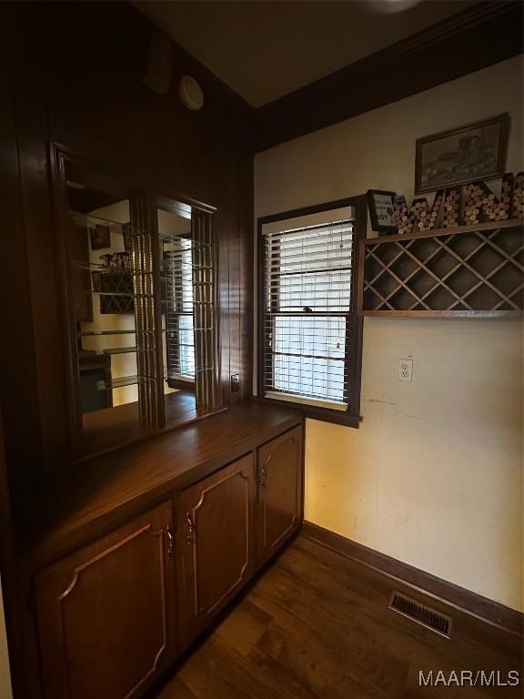 interior space with dark hardwood / wood-style flooring