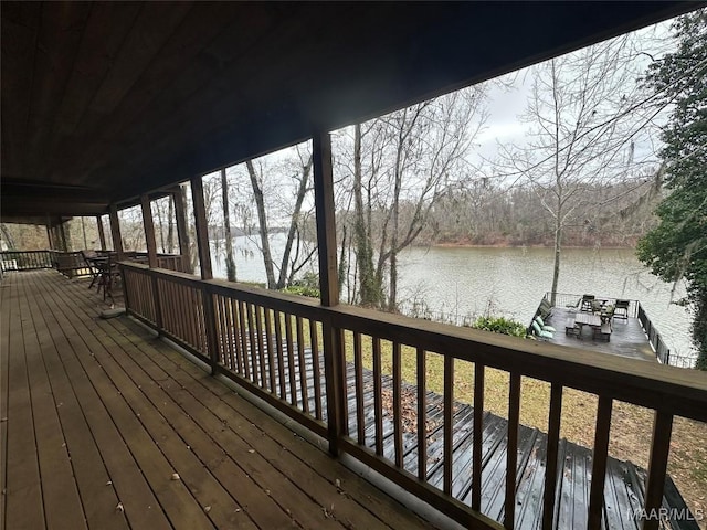 wooden terrace with a water view