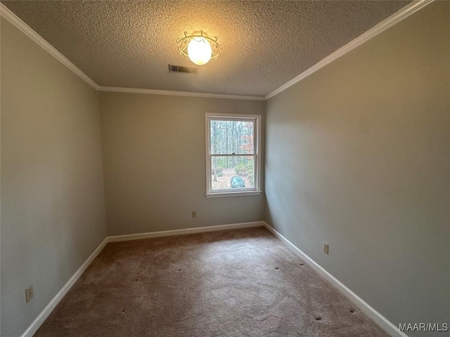 carpeted spare room with a textured ceiling and ornamental molding