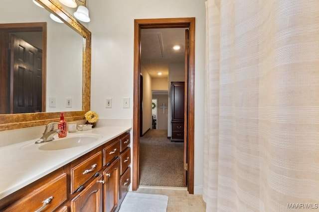 bathroom with vanity and tile patterned flooring