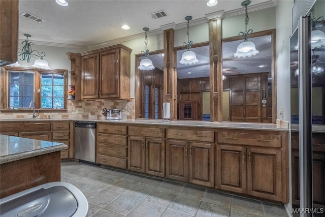 bathroom with tasteful backsplash, crown molding, and sink