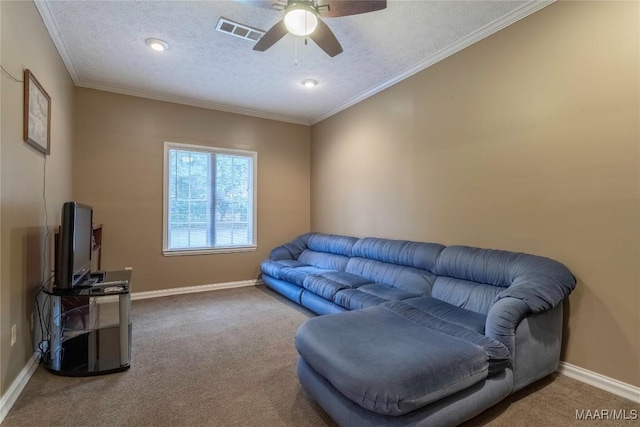 living room with crown molding, carpet floors, a textured ceiling, and ceiling fan