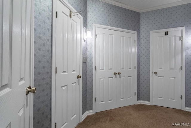 corridor featuring carpet floors and crown molding