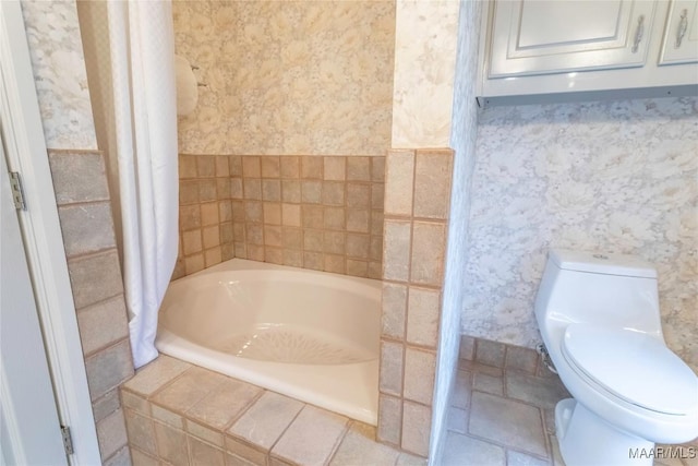 bathroom with a relaxing tiled tub and toilet