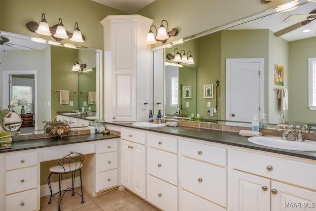 bathroom with vanity, tile patterned floors, and ceiling fan