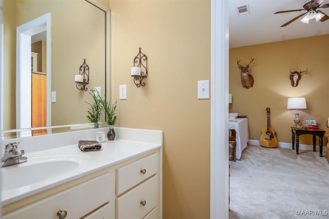 bathroom featuring vanity and ceiling fan