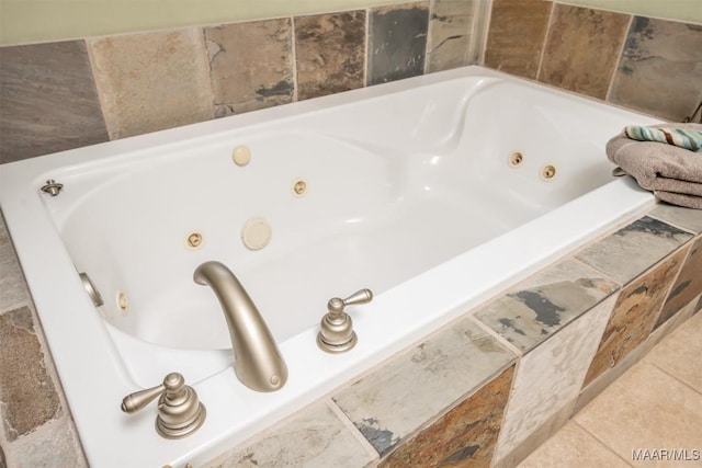 bathroom with tiled bath