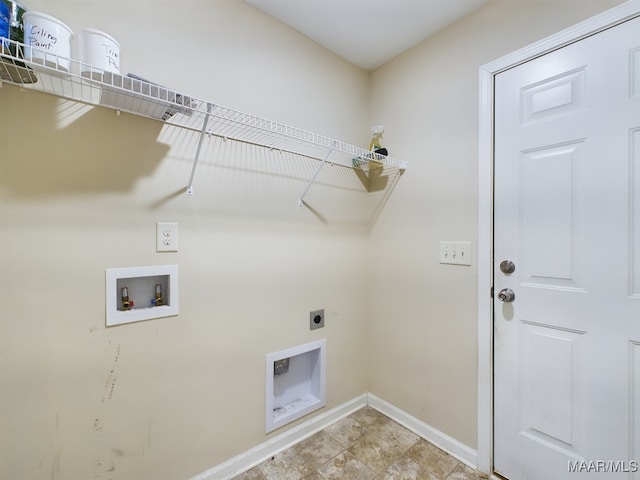 clothes washing area with washer hookup and hookup for an electric dryer