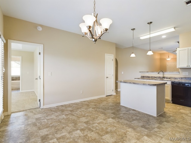 kitchen featuring white cabinetry, a center island, black dishwasher, a chandelier, and decorative light fixtures