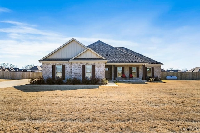 view of front of home with a front yard