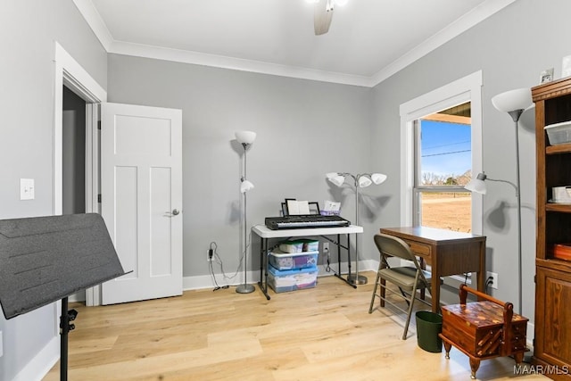 misc room featuring light wood-type flooring, ceiling fan, and ornamental molding