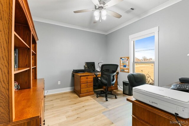 office featuring ceiling fan, ornamental molding, and light hardwood / wood-style flooring