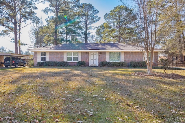 ranch-style home featuring a front lawn