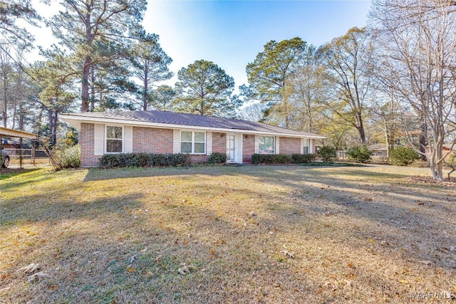 ranch-style home with a front yard