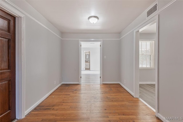 unfurnished room featuring light hardwood / wood-style flooring