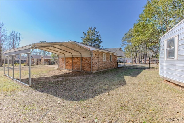 view of yard featuring a carport